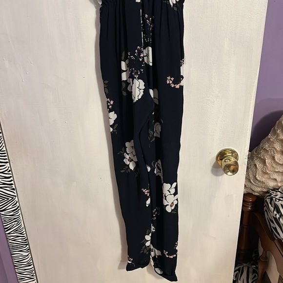 Women’s medium jumpsuit. Navy with floral print. New with tags still attached. - Picture 3 of 5